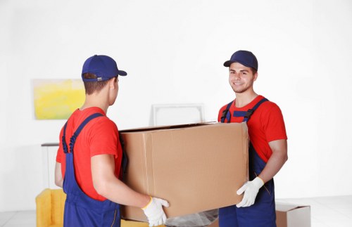 Commercial movers relocating office furniture and equipment in France