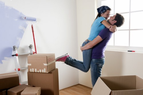 Loading furniture into a van for a home move in France