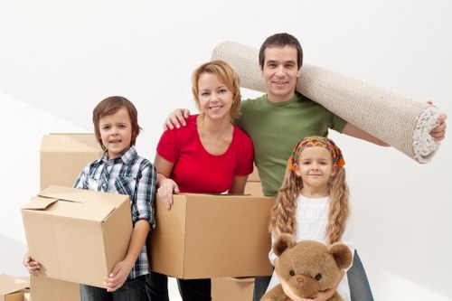 Loading furniture into a van for transport in France