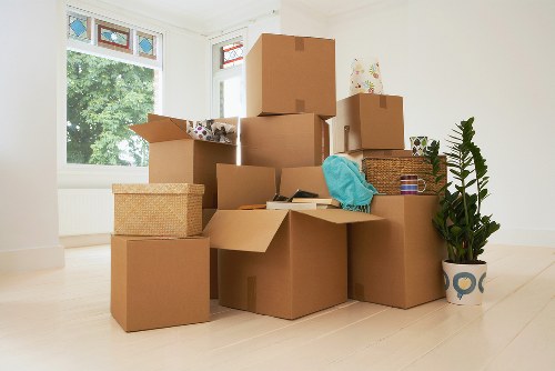 Packed boxes and furniture ready for transport in a French relocation